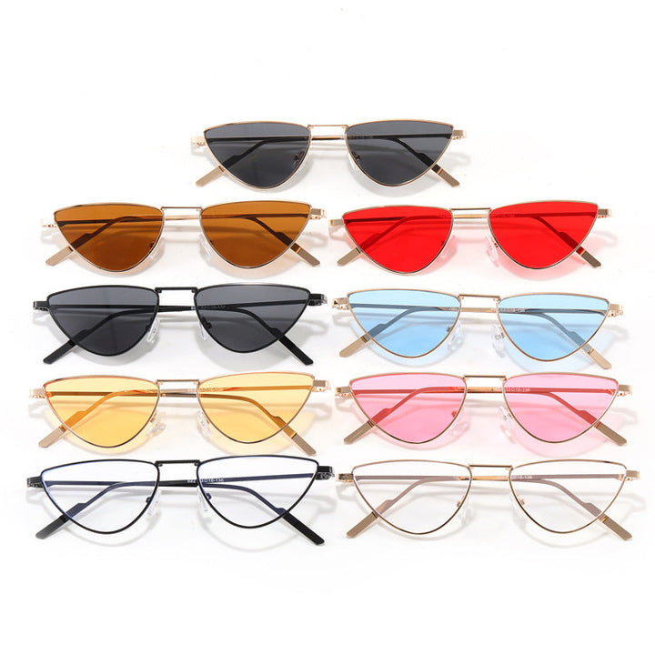 Woman wearing stylish cat-eye sunglasses, enjoying the summer with UV400 eye protection and a chic look.