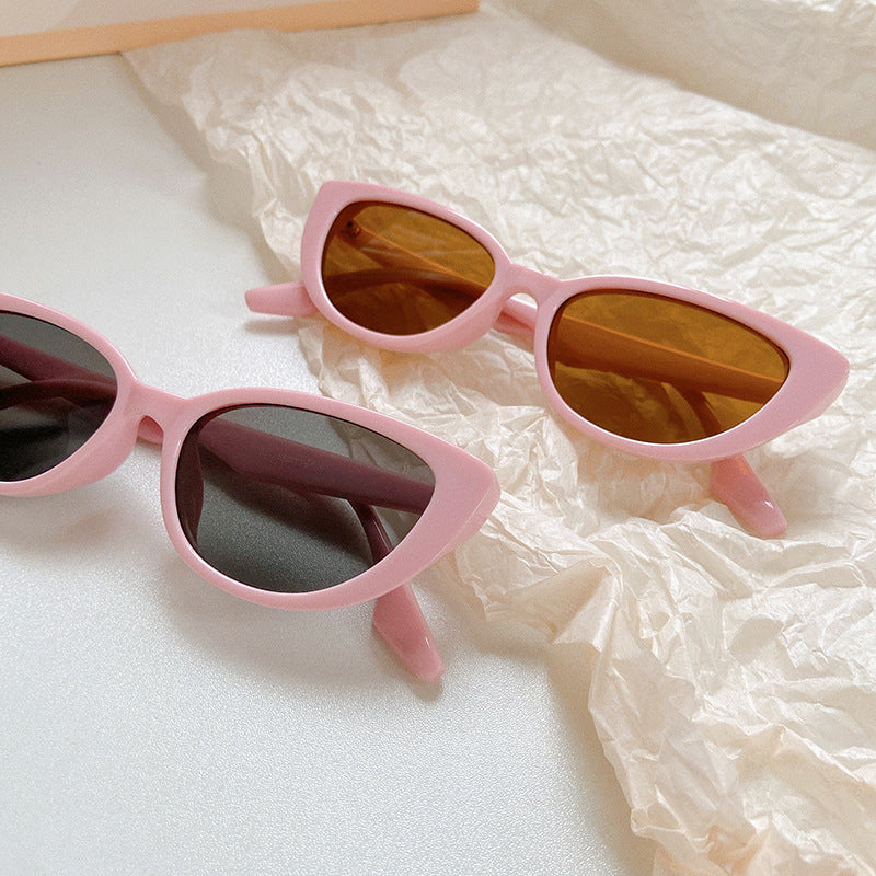 Elegant black cat-eye sunglasses for women. Essential UV protection eyewear & chic summer accessory.