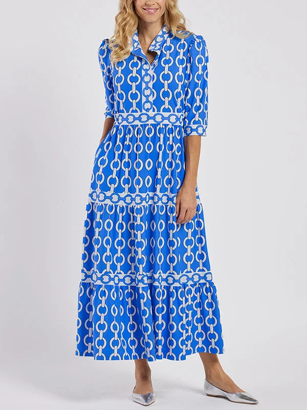 Modern chain-print women's day dress. Chic, versatile maxi style for elegant everyday summer fashion.