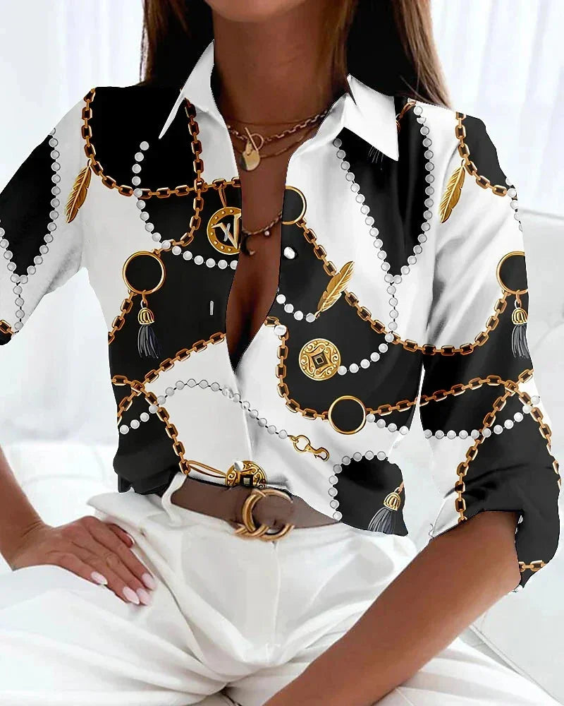 Stylish women's color-block printed blouse. Collared, 3/4 sleeve, button-down top, available in plus sizes.