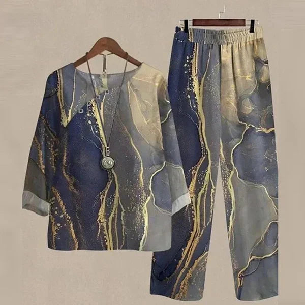 Full view of women's comfortable & chic shirt and trouser set, showcasing relaxed fit & style.