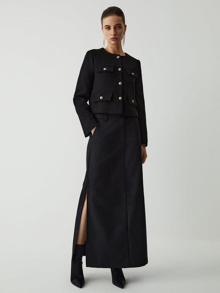 Chic women's cropped blazer, designed with elegant gold buttons for a stylish, modern look.
