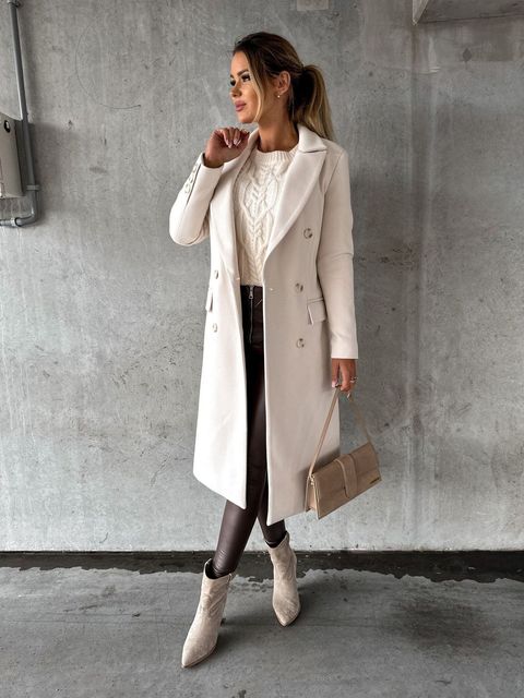 Classic women's double-breasted winter coat. Stylish and warm outerwear for cold weather fashion.
