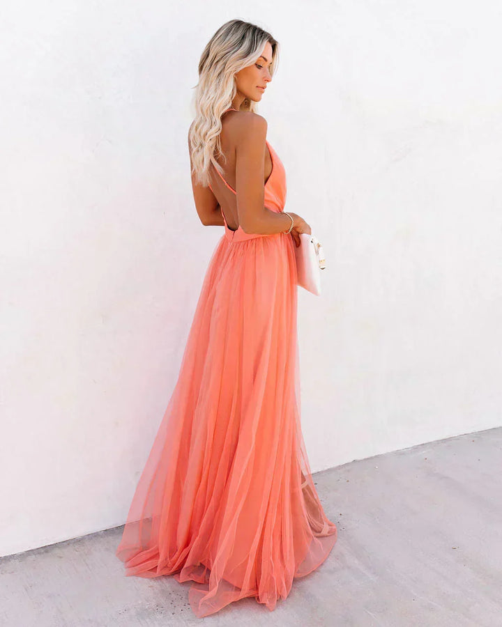 Women's chic flowing maxi dress in soft fabric. Perfect for effortless elegance & summer comfort.