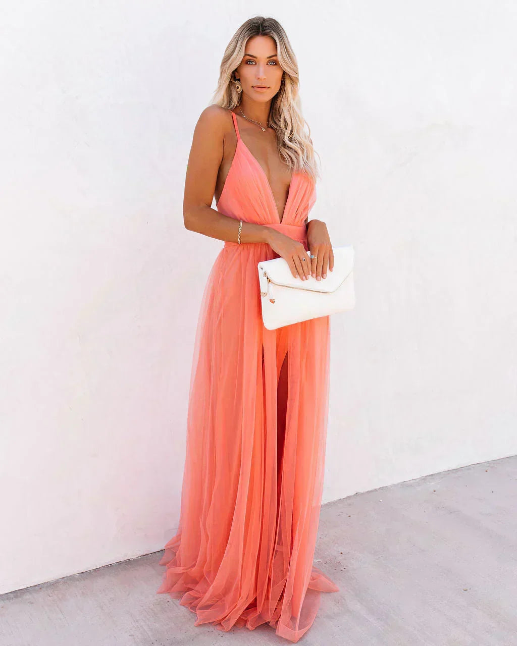 Feminine long dress; a chic flowing maxi dress. Elegant design perfect for summer and occasion wear.
