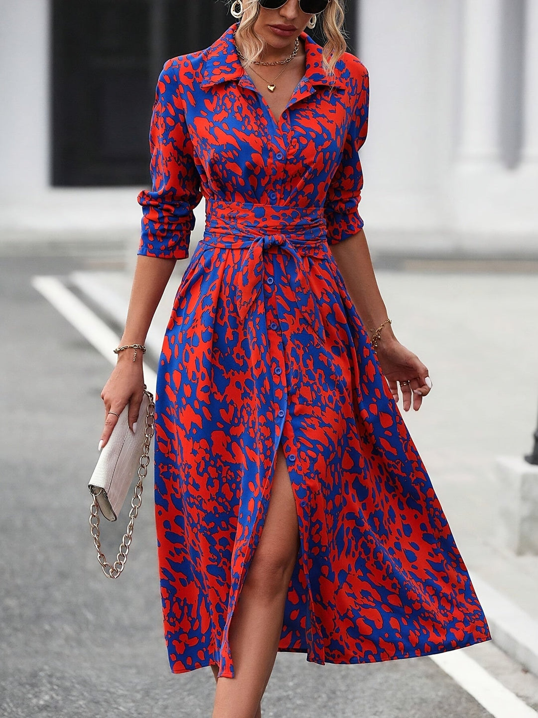 Women's chic geometric print belted midi shirt dress.