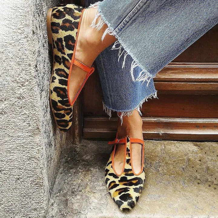 Women's chic leopard print T-strap pointed-toe flats for versatile daily wear or elegant fashion statements.