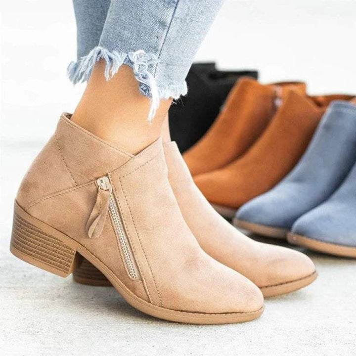 Everyday women's fashion ankle boots, low block heel design & side zip for ultimate comfort and easy wear.