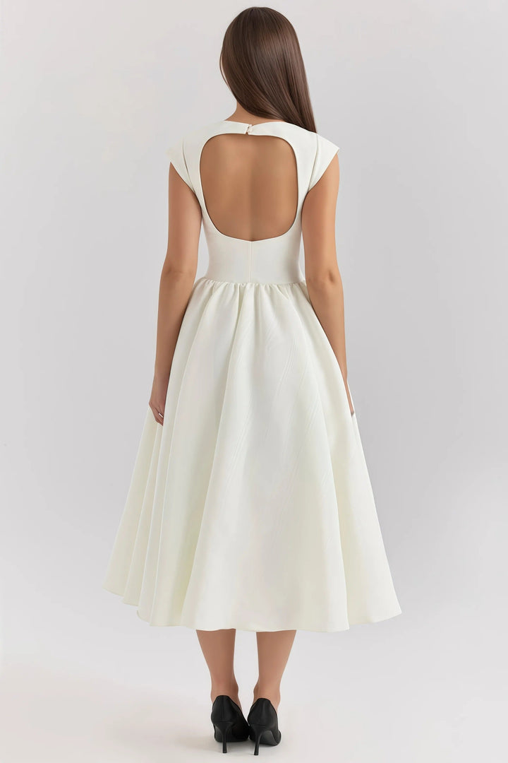 Versatile women's midi dress. Feminine design with elegant ruffles, great for spring/summer fashion.