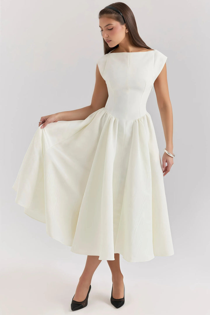 Chic women's midi dress featuring elegant ruffle details. A perfect feminine summer dress for any occasion.