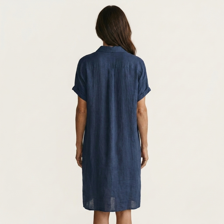 Chic women's relaxed fit midi shirt dress with rolled cuffs, a stylish button-down summer piece.