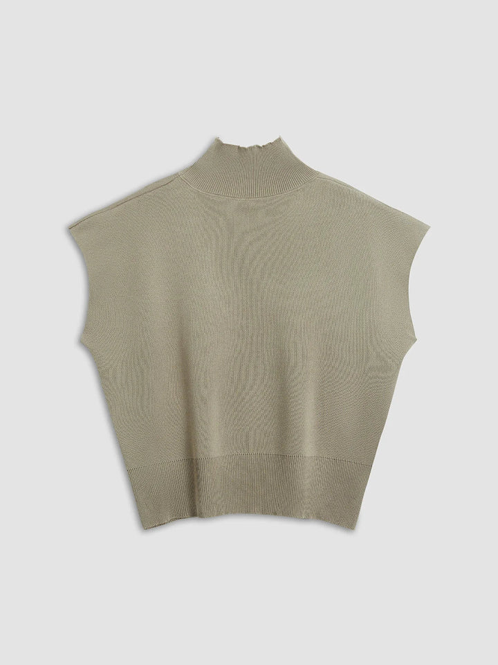 Modern women's mock-neck sweater with padded shoulders & cap-sleeves. Elegant layering.