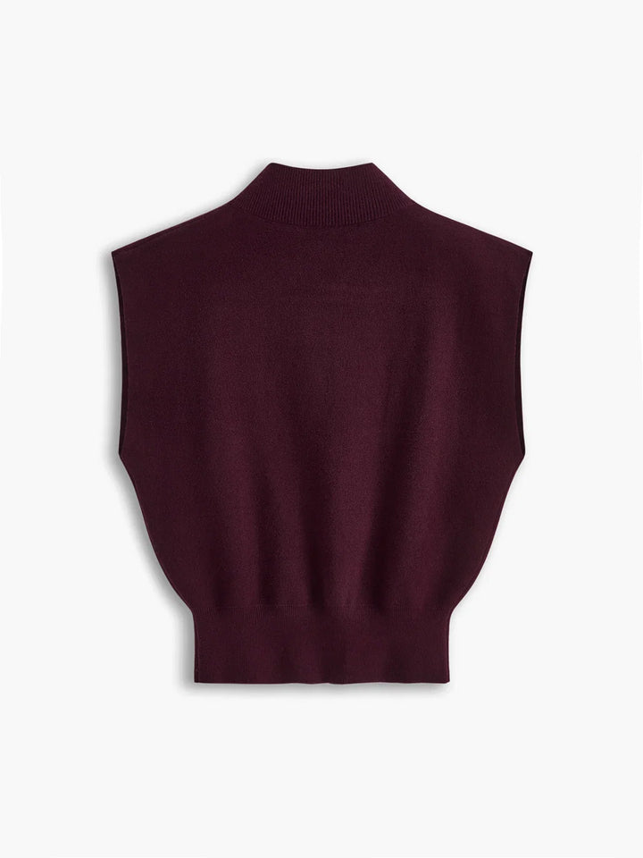 Sophisticated women's mock-neck top, padded shoulders & cap sleeves. Perfect for layering.