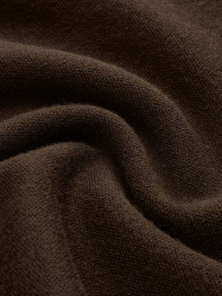 Versatile women's mock-neck top with padded shoulders & cap-sleeves. Sophisticated style.