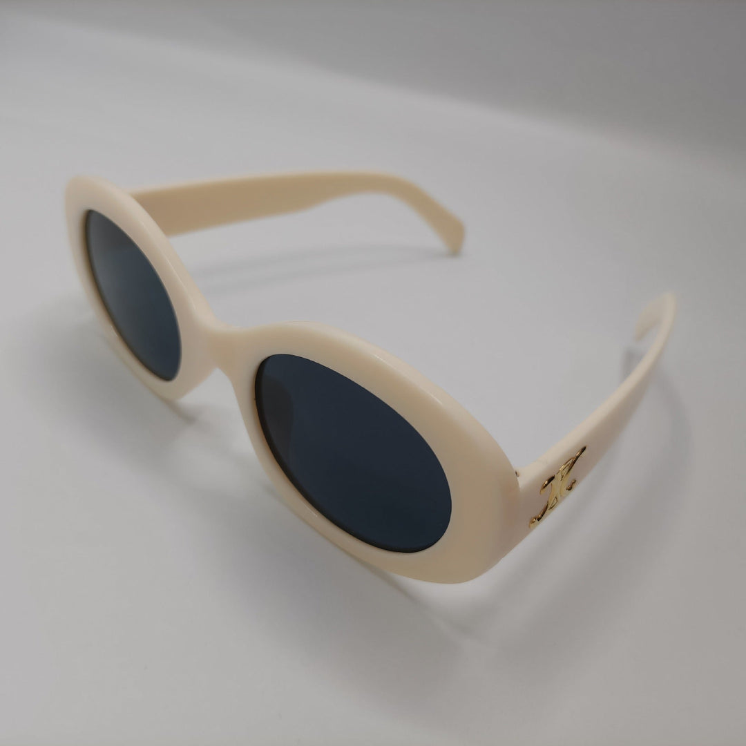 Women's chic modern round frame sunglasses with UV400 protection, perfect for summer fashion.