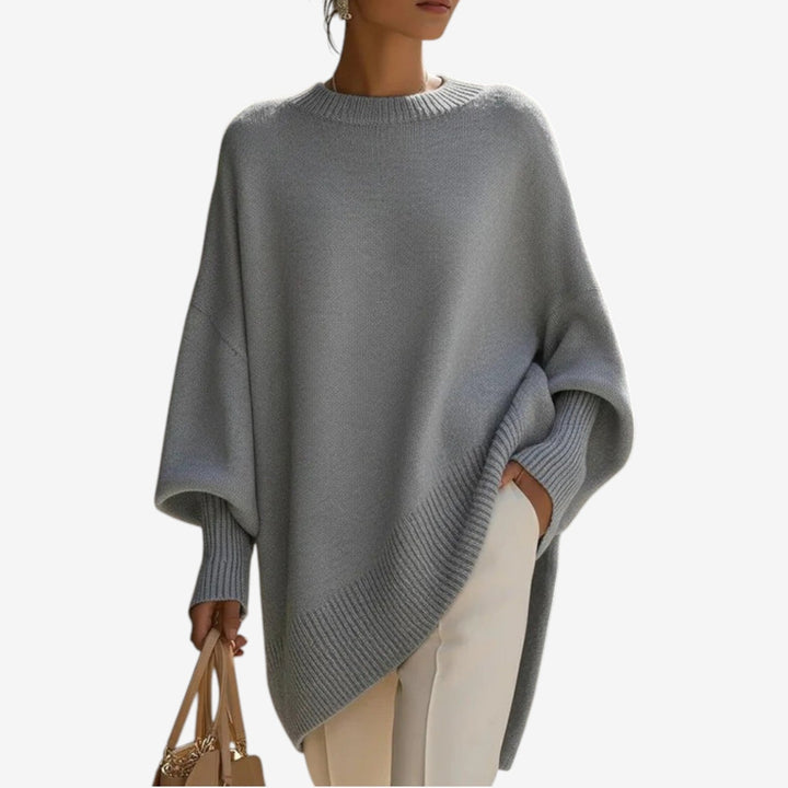 Comfortable women's relaxed fit oversized batwing sleeve sweater with crew neck, ideal for winter wear.