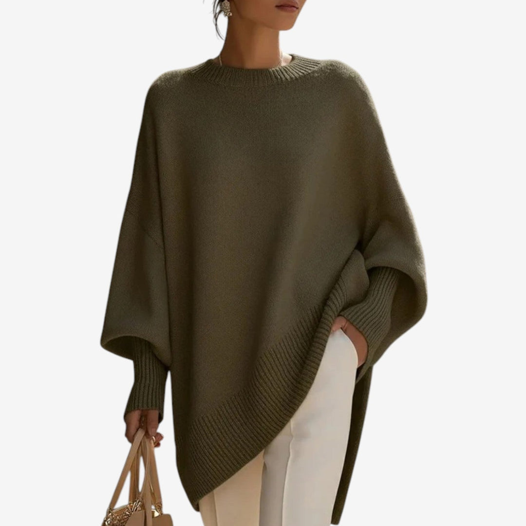 Autumn fashion women's oversized batwing sleeve sweater, comfortable & chic with an asymmetric hem.