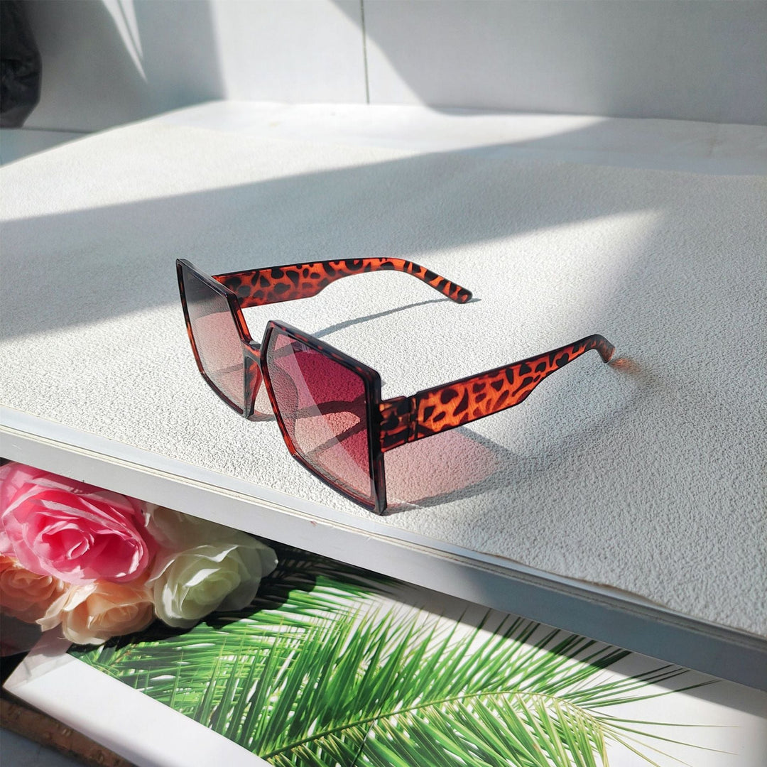 Glamorous oversized shades for women, fashionable eyewear providing essential UV protection.