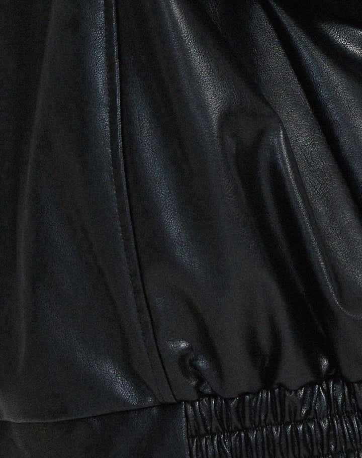 Streetwear-inspired black oversized jacket for women, combining trendy fashion with ultimate comfort.