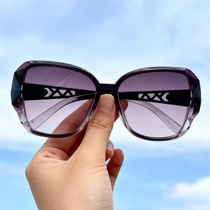 Chic women's oversized square sunglasses. Trendy UV protection eyewear, a fashion statement accessory.