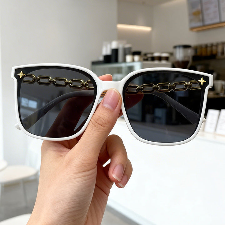 Women's chic oversized sunglasses with UV protection and polarized lenses.