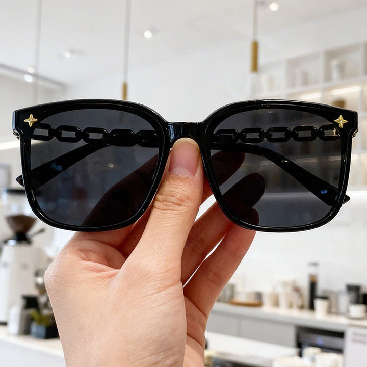 Women's oversized fashion accessory sunglasses, offering superior UV sun protection.