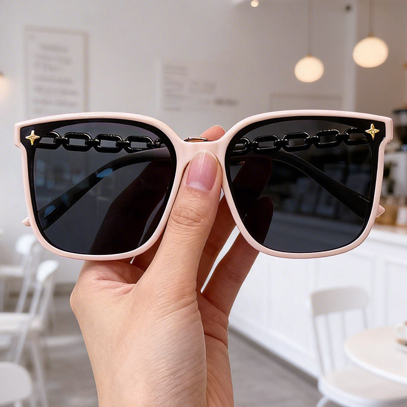 Women's chic oversized sunglasses, a fashionable eyewear accessory with polarized UV protection.