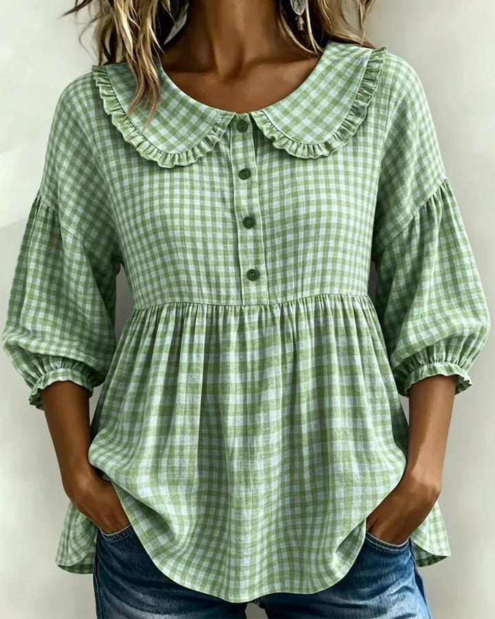 Women's chic plaid blouse with a classic Peter Pan collar & elegant lantern sleeves. Perfect for retro or smart casual looks.