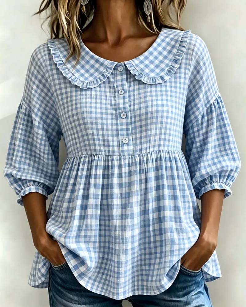 Stylish women's long sleeve plaid blouse featuring a charming Peter Pan collar and fashionable lantern sleeves.