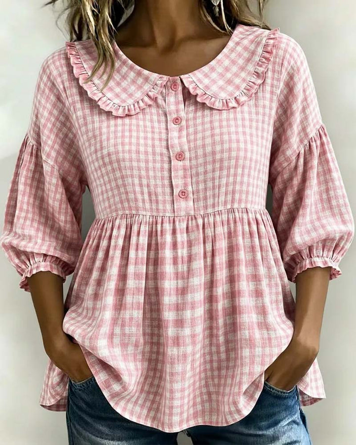 Elegant women's plaid Peter Pan collar blouse. This long sleeve top has unique lantern sleeves, ideal for smart casual.