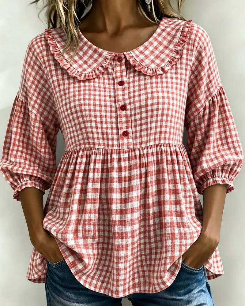 Women's chic plaid blouse featuring a stylish Peter Pan collar and fashionable lantern sleeves, perfect for elegant wear.