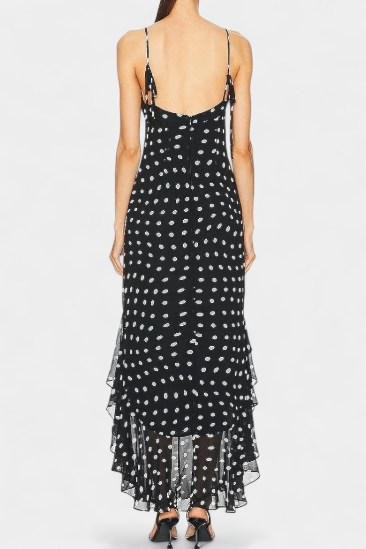 Timeless women's polka dot dress with adjustable straps, offering a chic and versatile look for any event.
