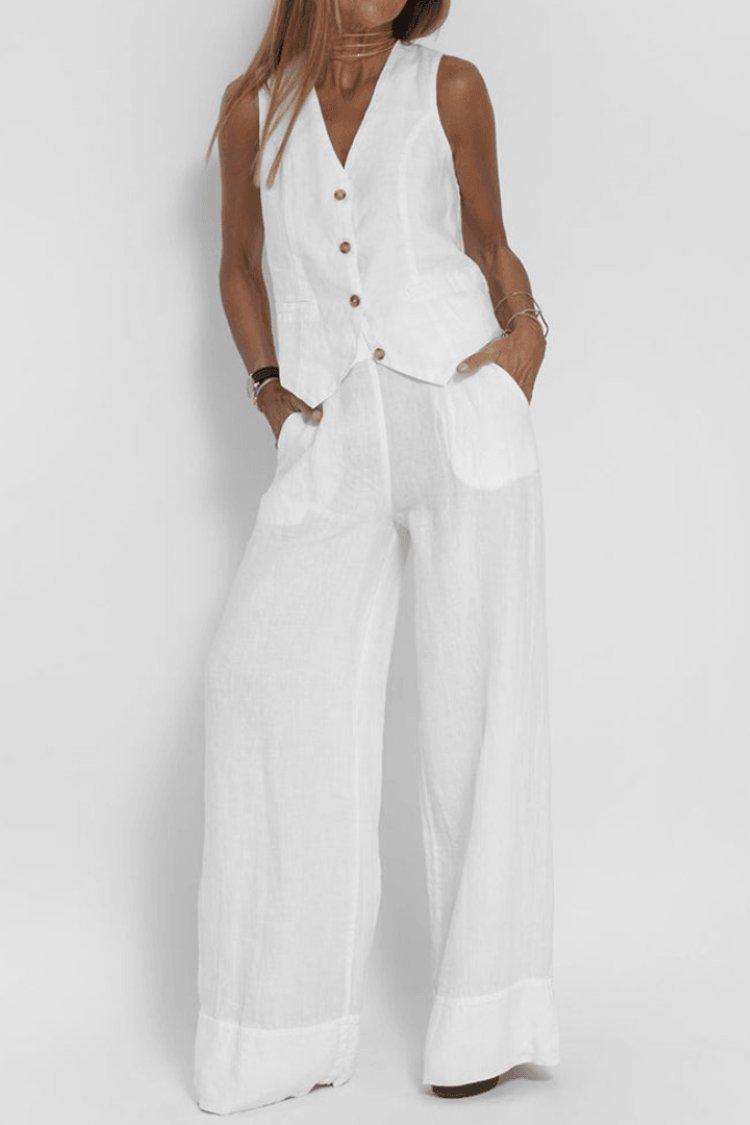 Relaxed fit women's two-piece set with sleeveless button-front top & wide-leg pants, ideal for summer.