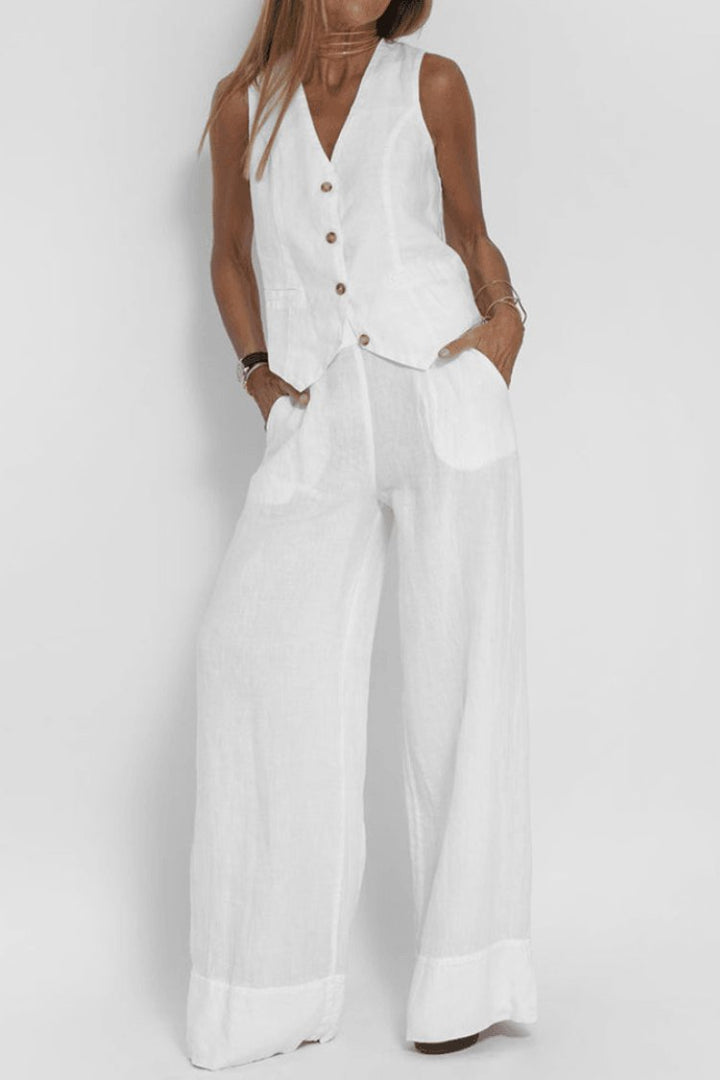 Relaxed fit women's two-piece set with sleeveless button-front top & wide-leg pants, ideal for summer.
