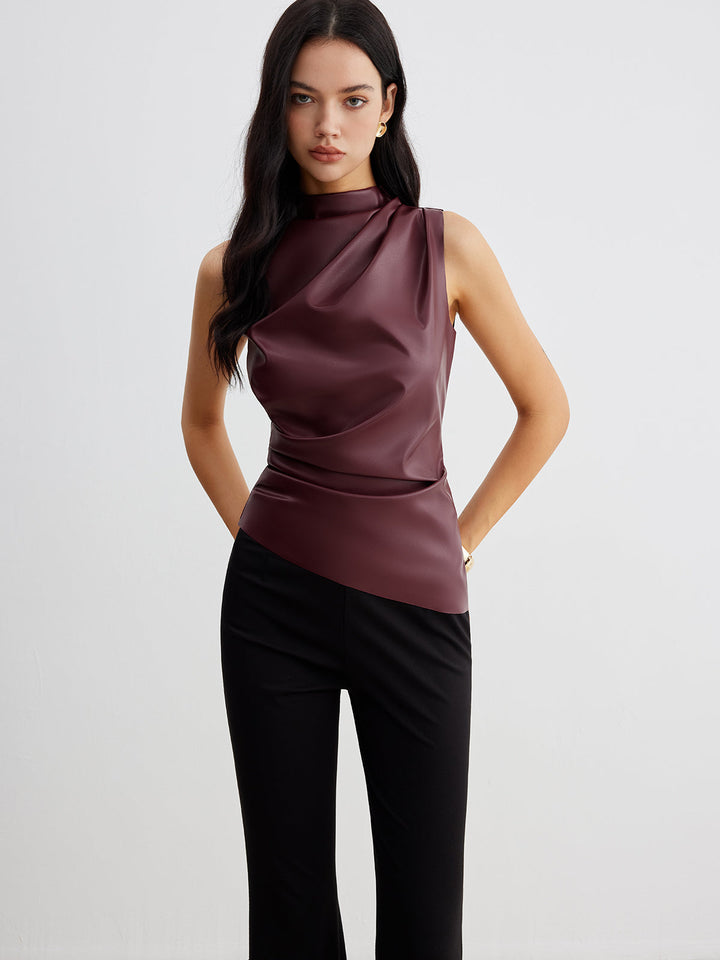 Stylish women's sleeveless high neck top perfect for summer fashion. Chic & modern design for elegant wear.
