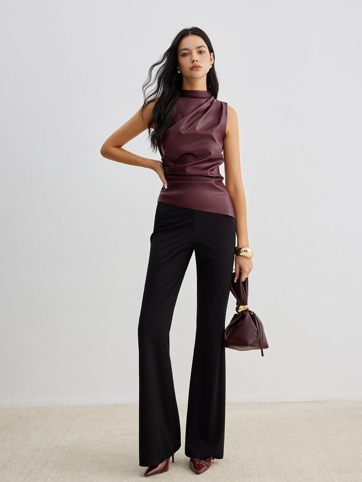 Versatile women's high neck sleeveless top. A chic and modern tank, ideal for both daytime & evening wear.