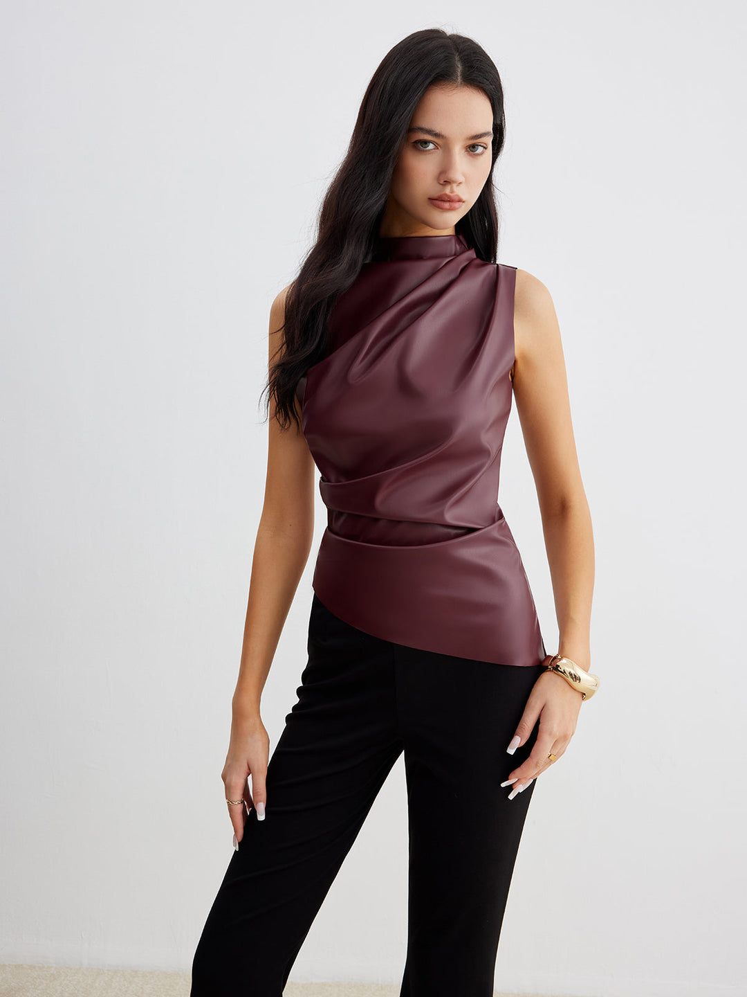 Elegant women's sleeveless high neck top. Chic summer fashion, comfortable for modern style & versatile wear.