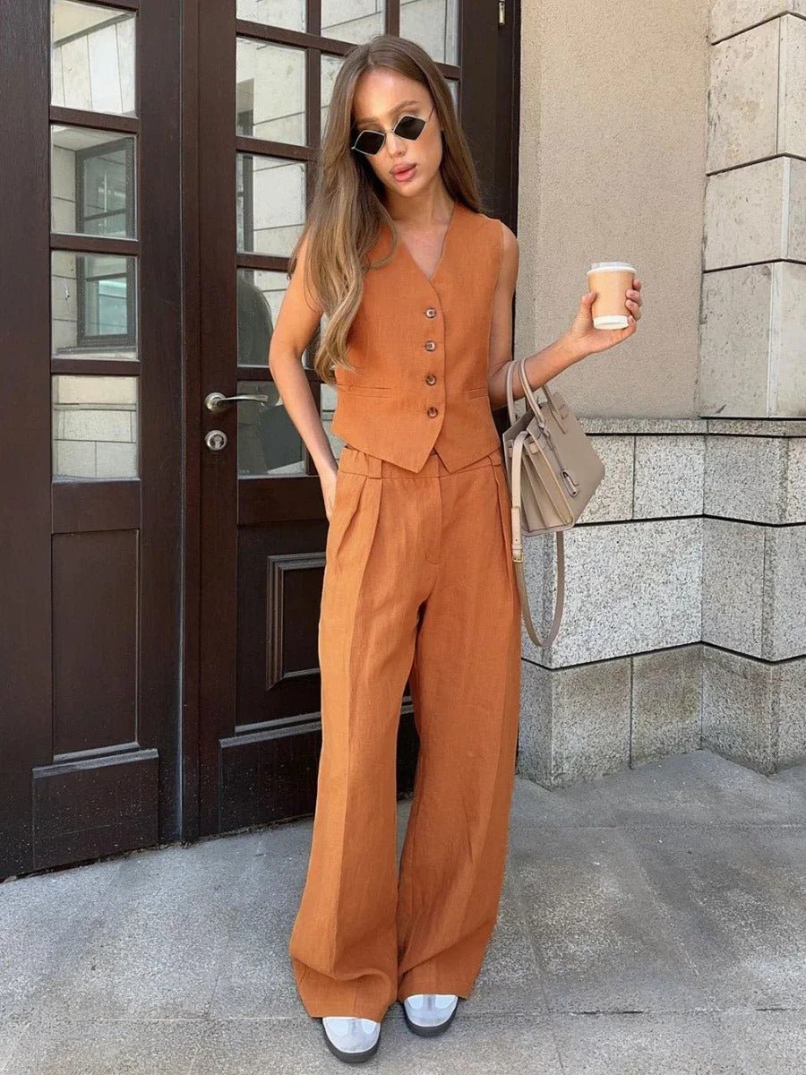 Elegant women's sleeveless vest and flowing wide leg trousers set. Perfect for summer fashion or casual chic.
