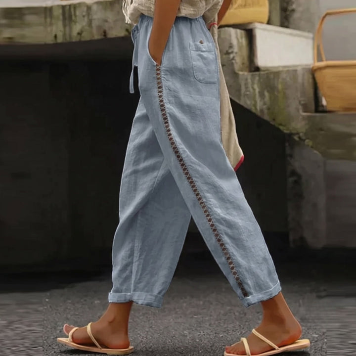 Effortlessly chic women's high waist striped trousers. Ideal for casual summer fashion & versatile apparel.