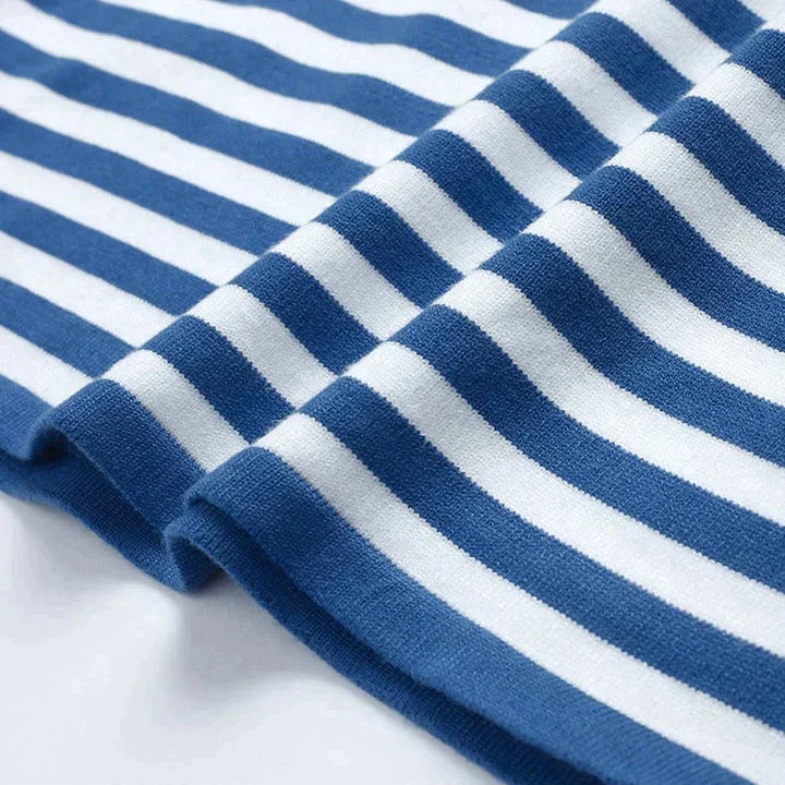 Fashionable women's striped long-sleeve tee, offering effortless style and comfort for everyday wear.