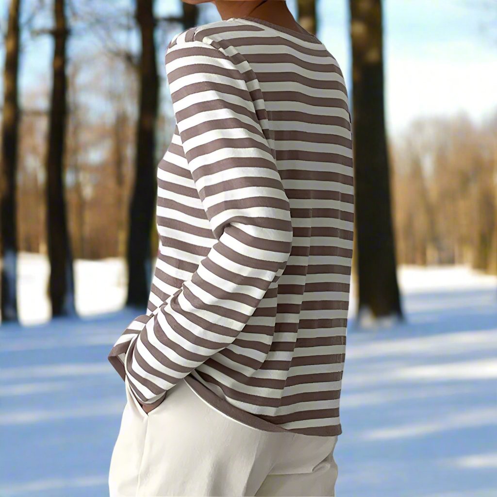 Essential women's striped long-sleeve t-shirt, a comfortable & chic round neck top for versatile everyday style.
