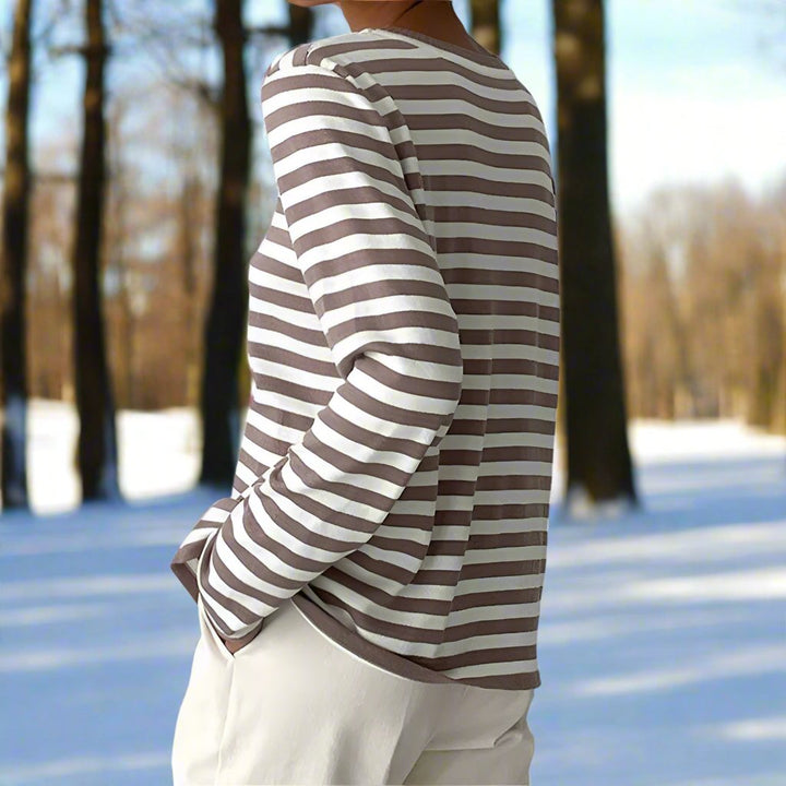 Essential women's striped long-sleeve t-shirt, a comfortable & chic round neck top for versatile everyday style.