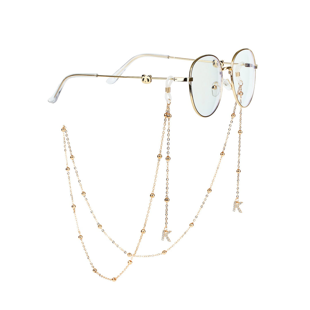 Women's chic pearl-beaded sunglasses chain, fashionable eyewear strap and holder.