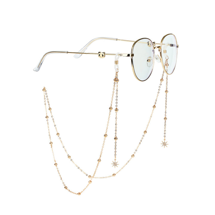 Versatile women's eyewear chain, functions as a stylish accessory and secure glasses holder.