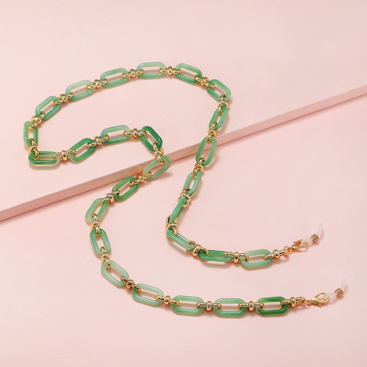 Women's fashionable sunglasses with a unique chain pendant, ensuring anti-loss security & chic style.