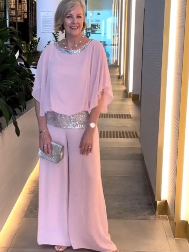 Women's chic two-piece outfit set, elegant chiffon wide-leg pants & top for spring/summer style.