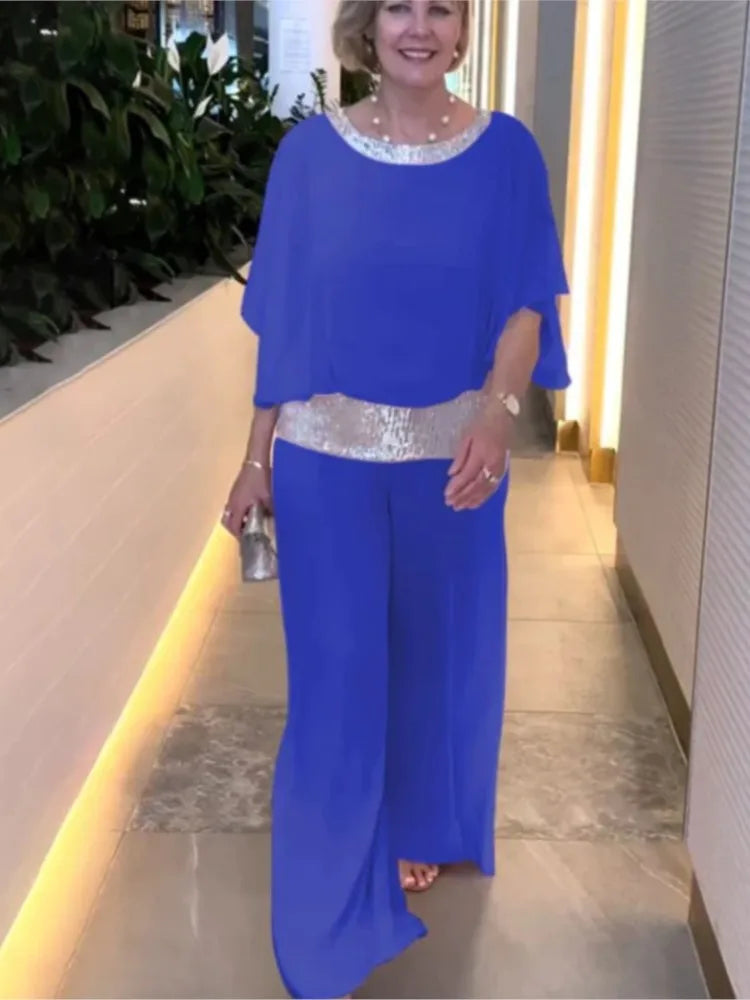 Women's stylish two-piece chiffon outfit set with wide-leg pants for elegant, comfortable spring/summer fashion.