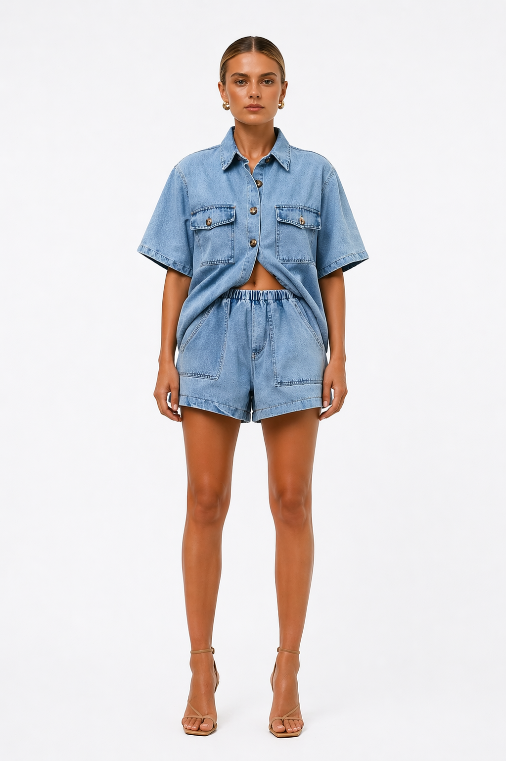 Chic women's two-piece ensemble featuring a relaxed shirt & high-waist shorts for ultimate comfort.