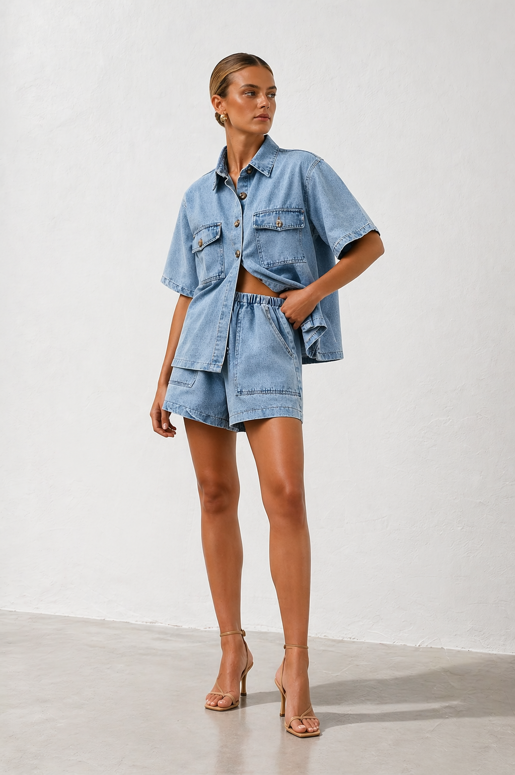 Women's matching shirt and high-waist shorts outfit, perfect for summer vacations & resort wear.
