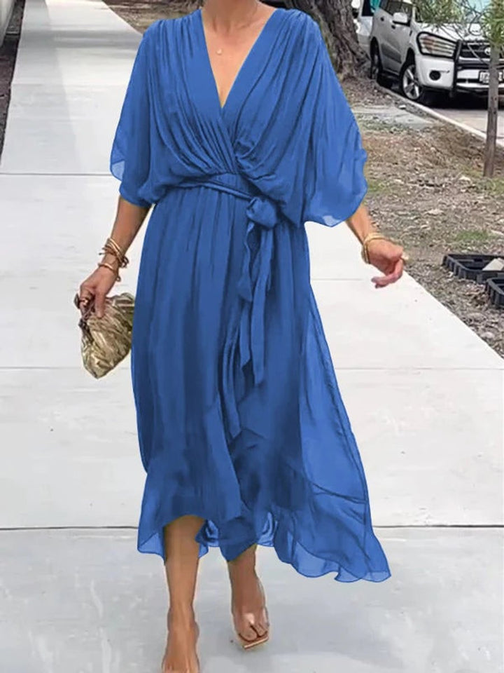 Chic women's V-neck belted midi summer dress, a versatile occasion wear fashion piece.